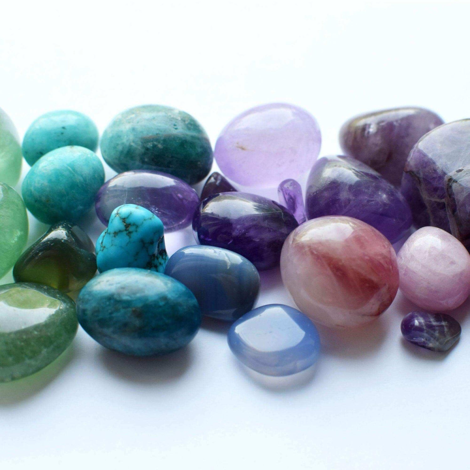 Colorful collection of polished stones showcasing natural beauty and artistic craftsmanship.